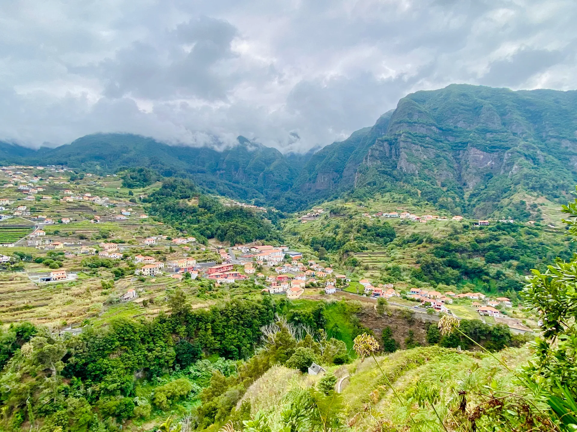 Terraced valley village surrounded by green mountains in Madeira