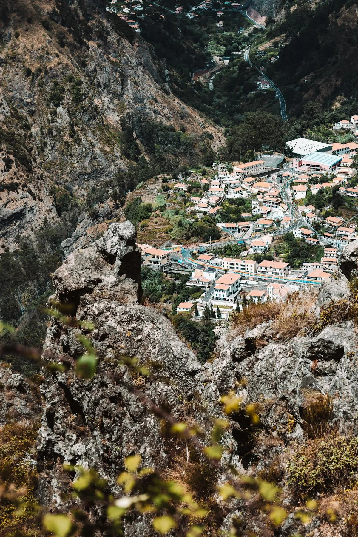 Mountain village nestled between steep cliffs in Madeira